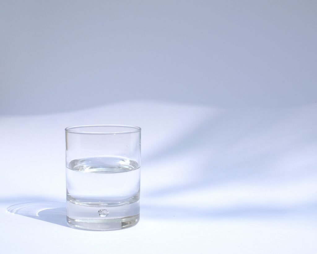 glass of water sitting alone